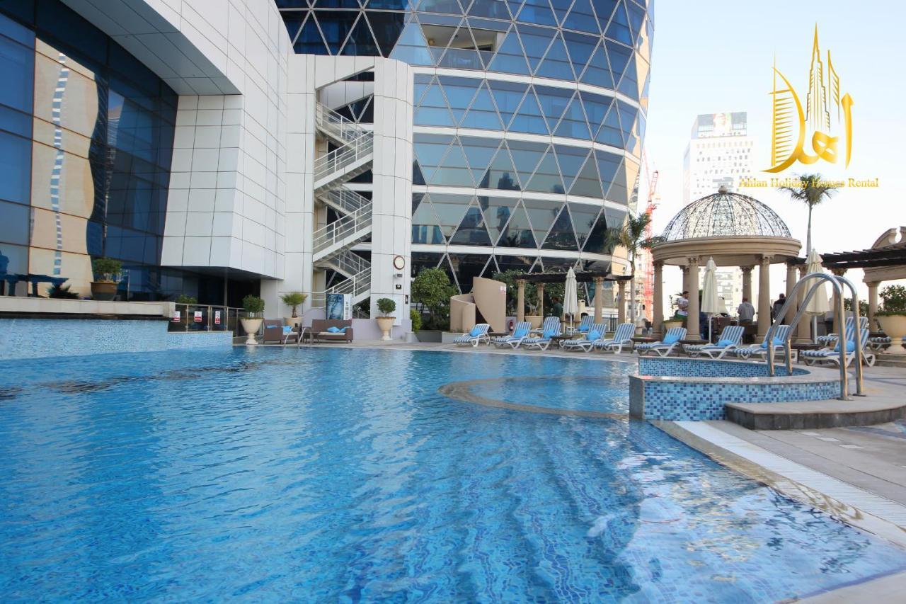 Ahlan Holiday Homes - Damac Park Towers Dubái Exterior foto